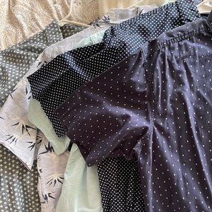 5 Large button up shirts.  5 different brands. Each one a varying shade of blue